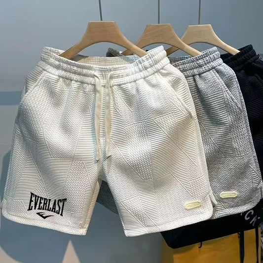 Novos shorts casuais estampados, modernos e populares para homens, respiráveis e confortáveis, ideais para esportes de primavera e verão.