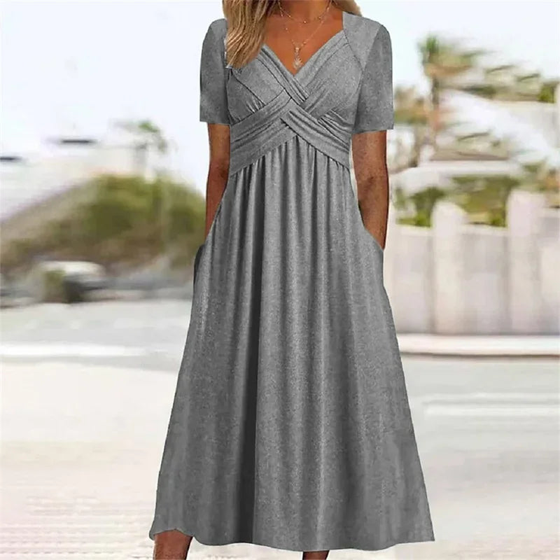 luxo e estilo Vestindo  você ,vestido elegante com decote em V, transpassado e modelagem envelope, em cor sólida, manga curta, ideal para o verão, perfeito para o dia a dia. Possui bolsos laterais duplos